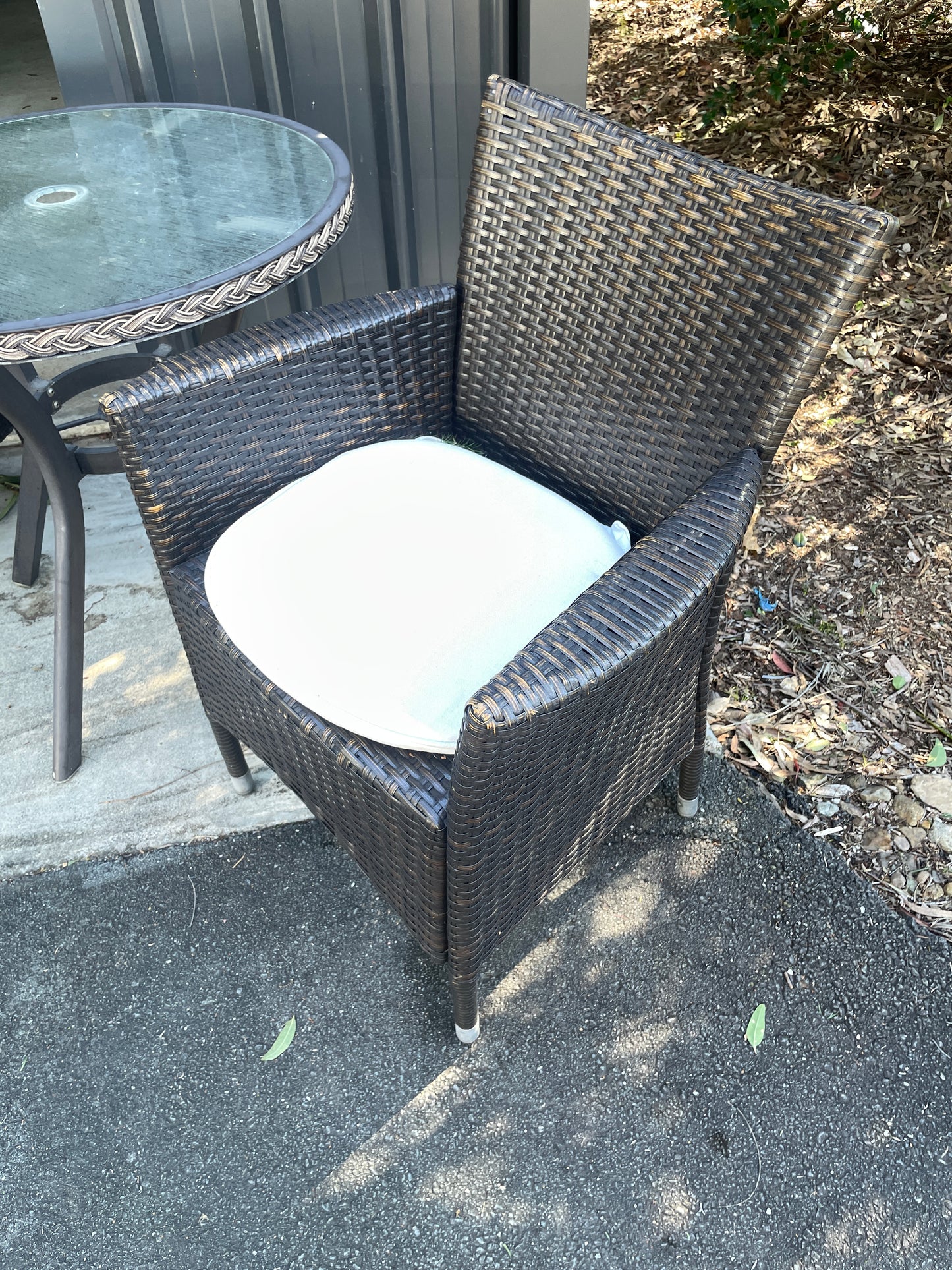 Outdoor Glass Tables and Rattan Chairs