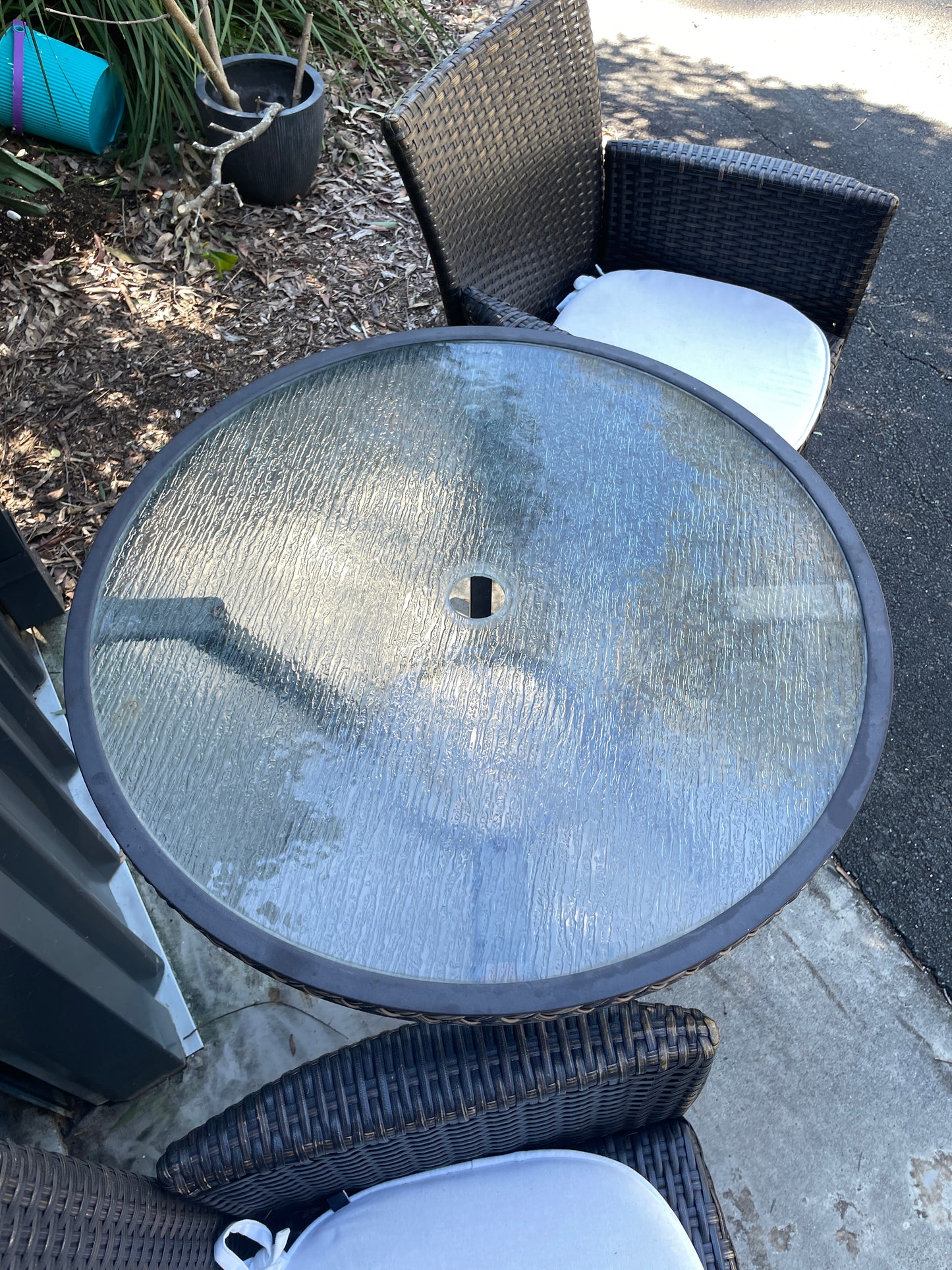 Outdoor Glass Tables and Rattan Chairs