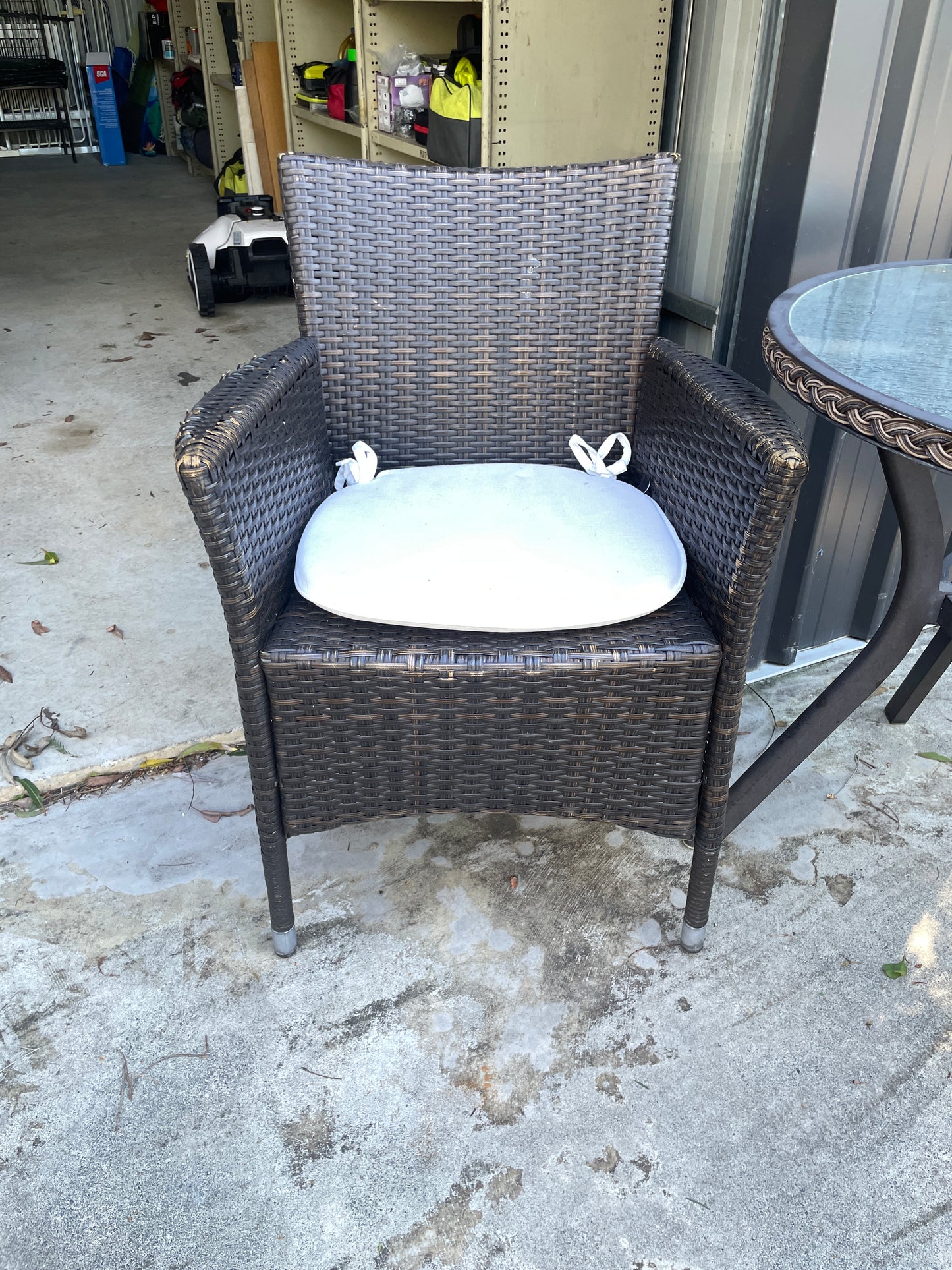 Outdoor Glass Tables and Rattan Chairs