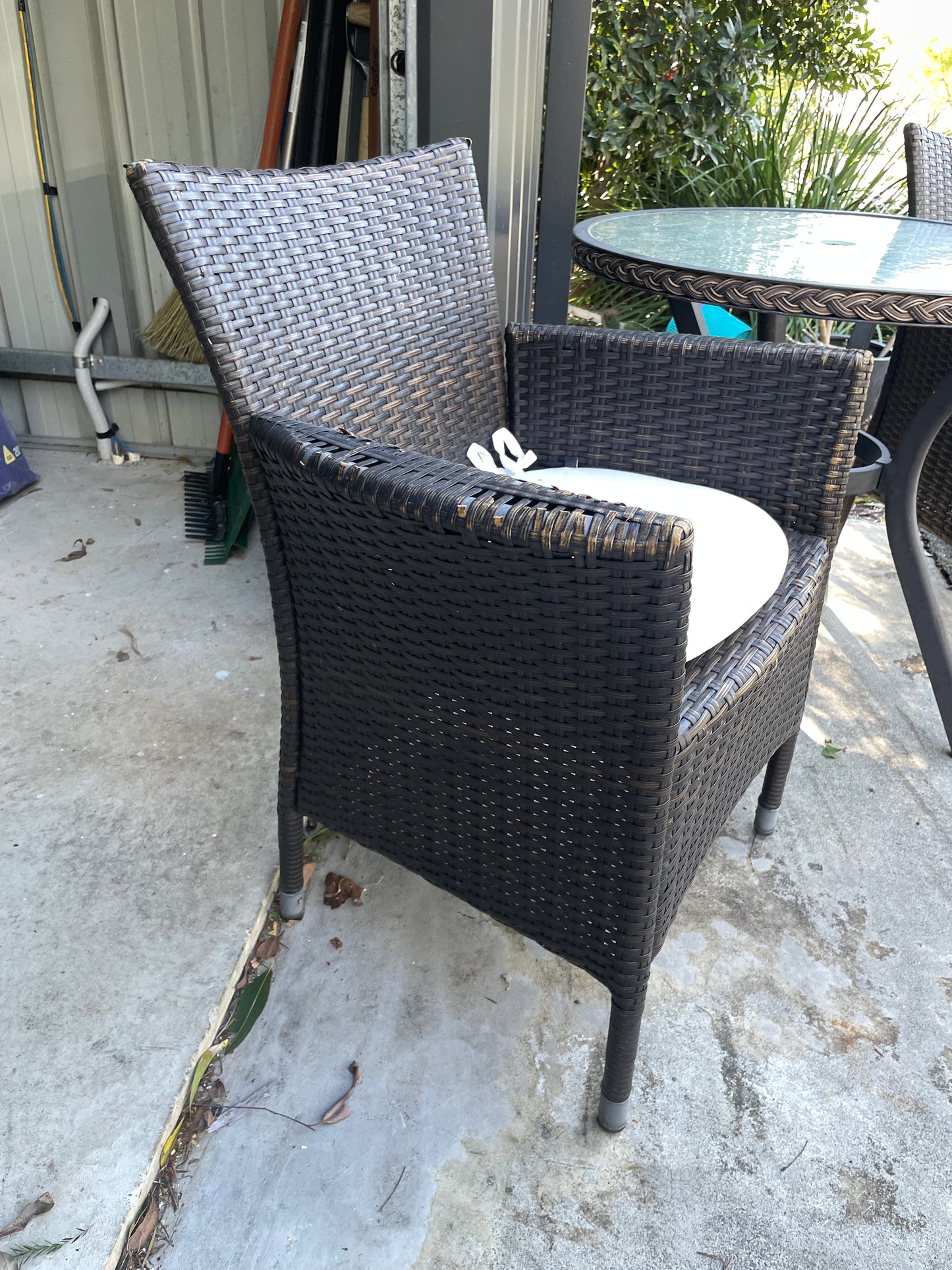 Outdoor Glass Tables and Rattan Chairs