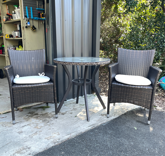 Outdoor Glass Tables and Rattan Chairs